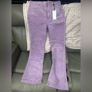 Brand new with tags. Purple corduroy wrangler jeans